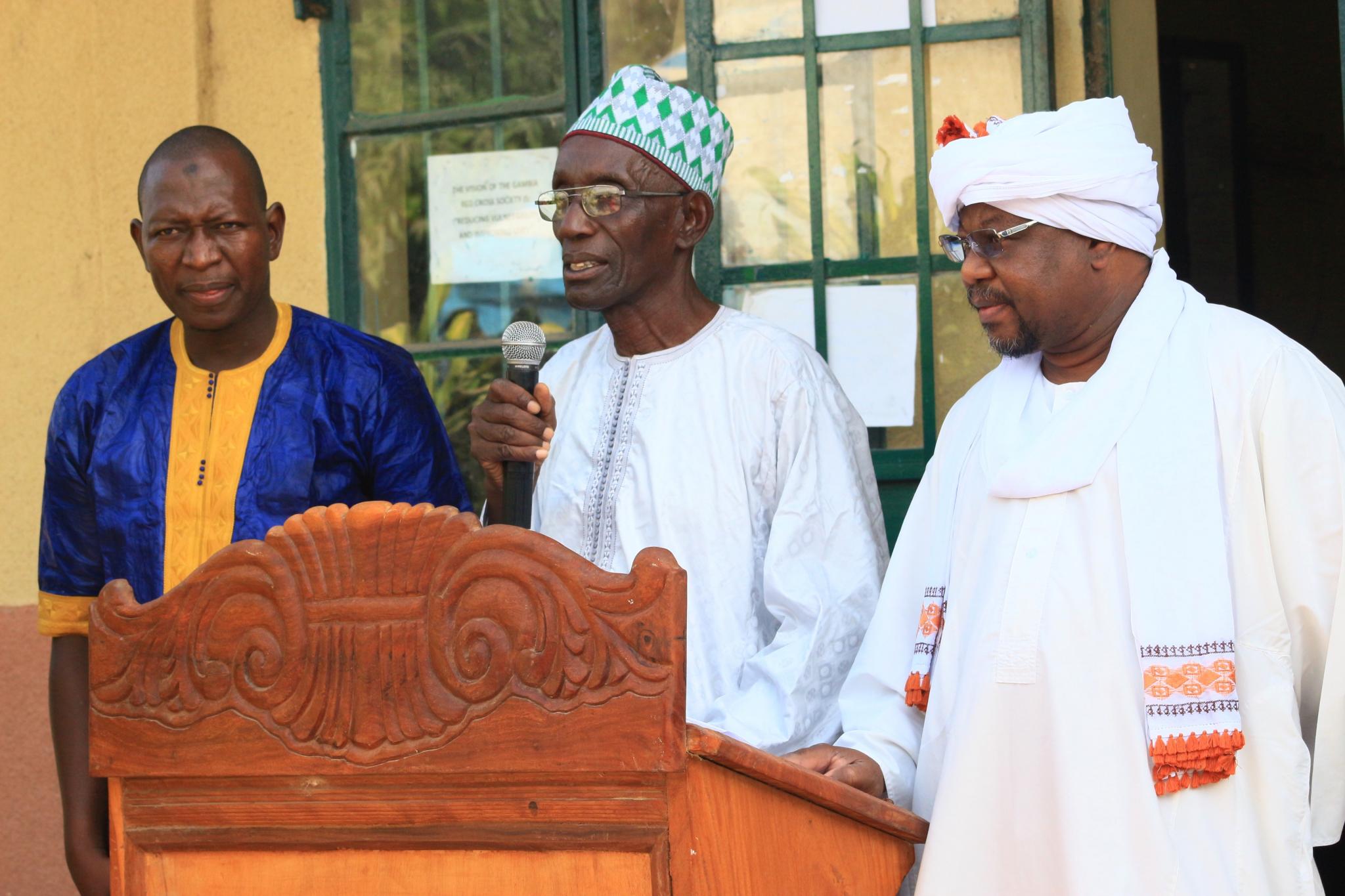 The principal addressing the gathering